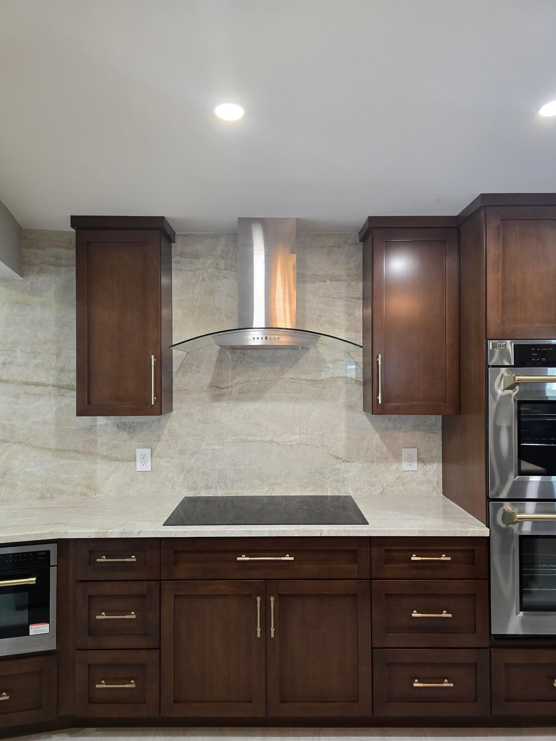 Kitchen remodeling in Riverview FL with custom cabinets, quartz or granite countertops, backsplash, modern lighting, open concept design and new flooring