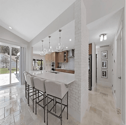 Kitchen remodeling in Citrus Park FL with custom cabinets, quartz or granite countertops, backsplash, modern lighting, open concept design and new flooring